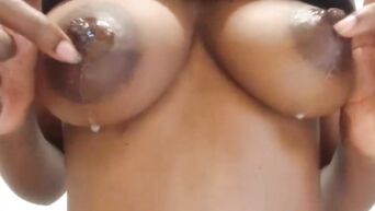 African webcam model milks natural boobs