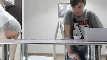 Bored of that puzzle game and she gives him a blowjob under the table