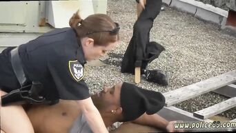Real porn: nigga fucks with busty MILF and her police girlfriend on the roof