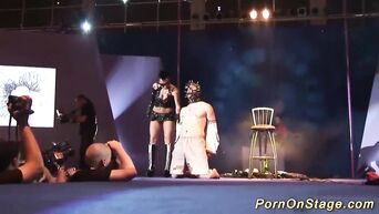 Mistress publicly humiliates slave with whips and violent games with needles